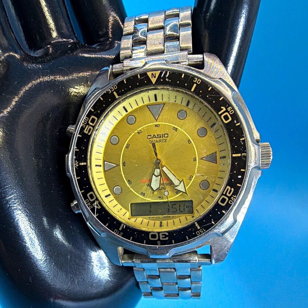 Casio AMW-320D Men's Quartz Ana-Digi Watch Gold Dial Black Bezel SS Bracelet